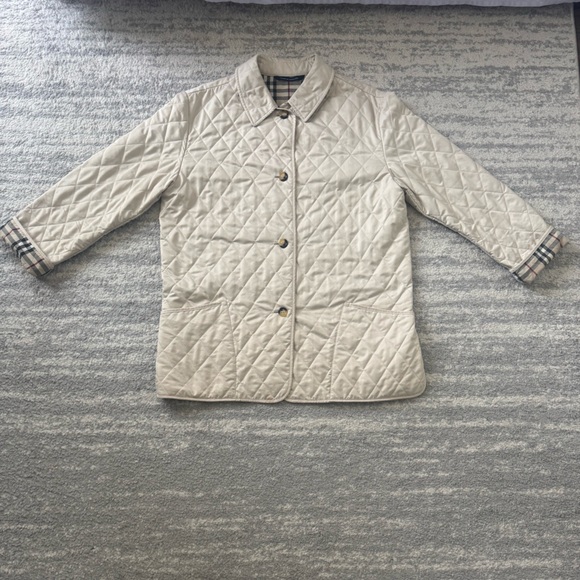 Burberry Jackets & Blazers - Burberry Cream Quilted Utility Jacket with Plaid Cuff Trim